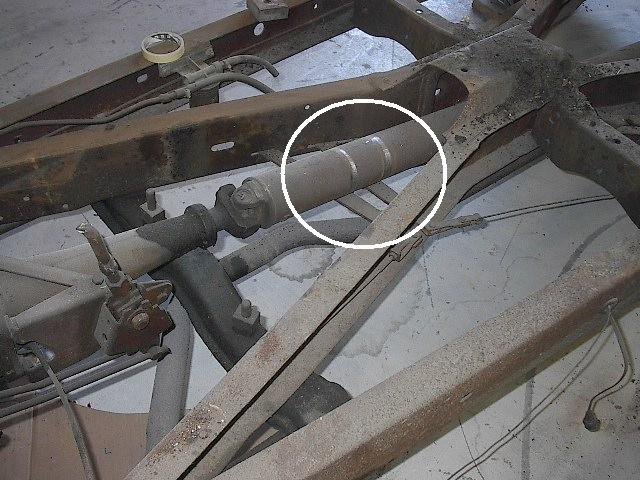 Transmission_shift_linkage_and_driveshaft.jpg
